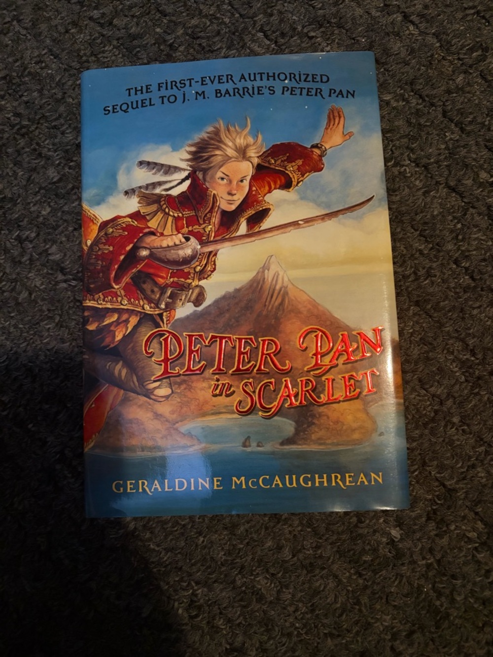 Peter Pan in scarlet by Geraldine mccaughrean.